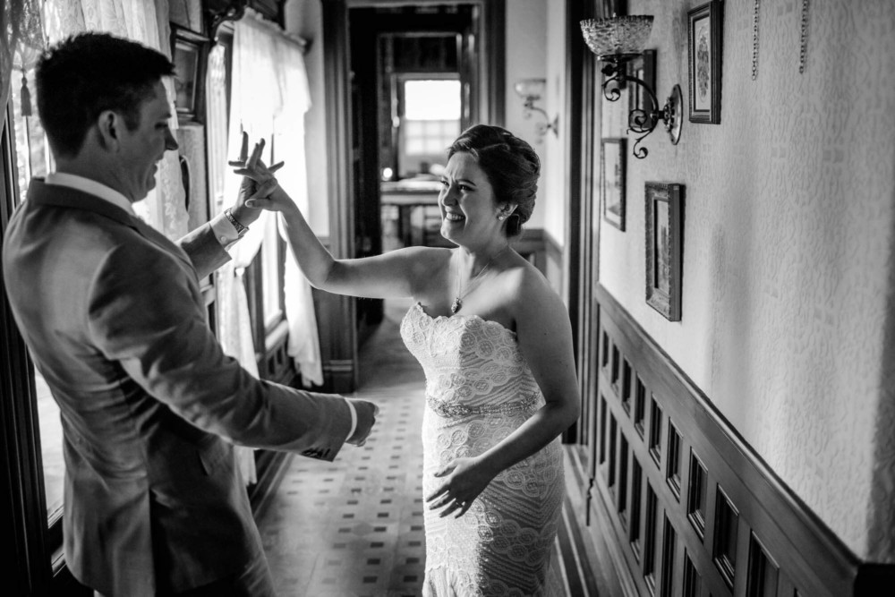 Emotional moment during the bride and groom's first look before their wedding at The Winchester Mystery House in San Jose, CA