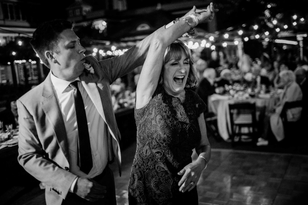 The groom spins his mother during the mother-son dance at a wedding reception at the Winchester Mystery House in San Jose, CA