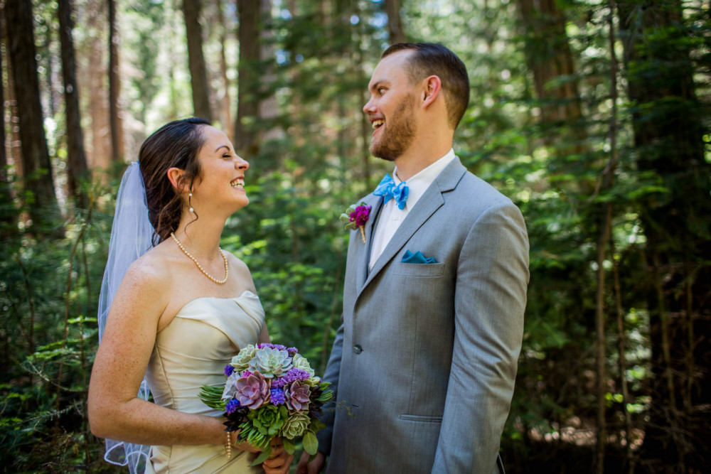 Goofy moment between bride and groom before their wedding in Yosemite Valley