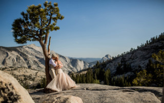Portrait of a Bride and Groom at Olmstead Point overlooking Half Dome after their wedding in Tuolumne Meadows in Yosemite National Park
