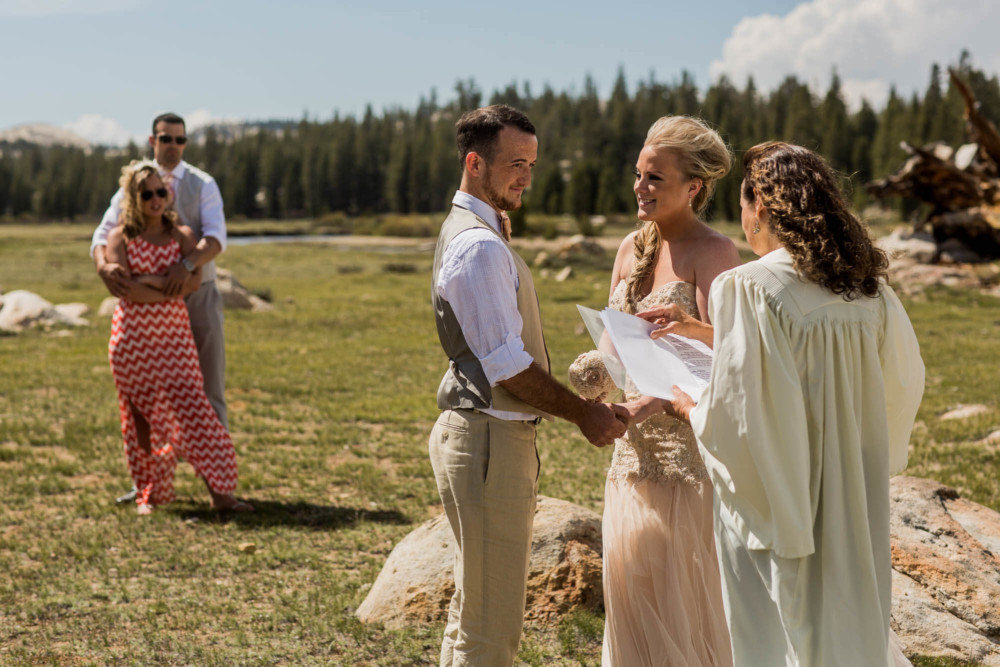Guests watch as a Bride and Groom elope in Tuolumne Meadows in Yosemite National Park