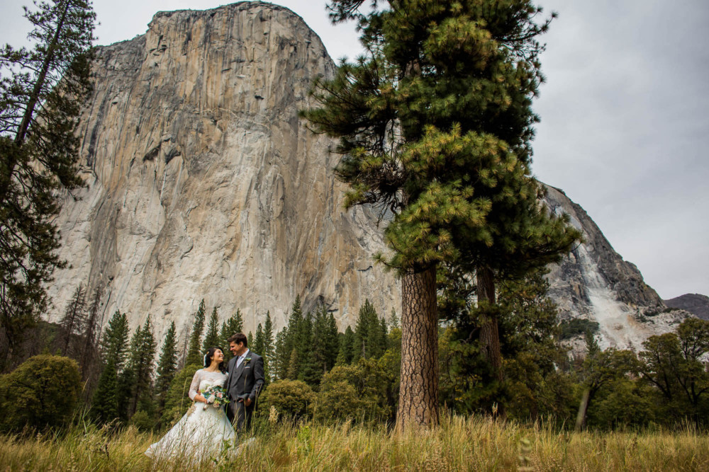 Portrait of bride and groom in front of El Capitan