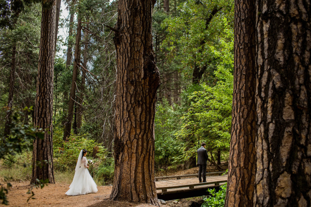 First look between bride and groom in Yosemite