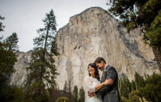 Portrait of bride and groom in front of El Capitan in Yosemite National Park