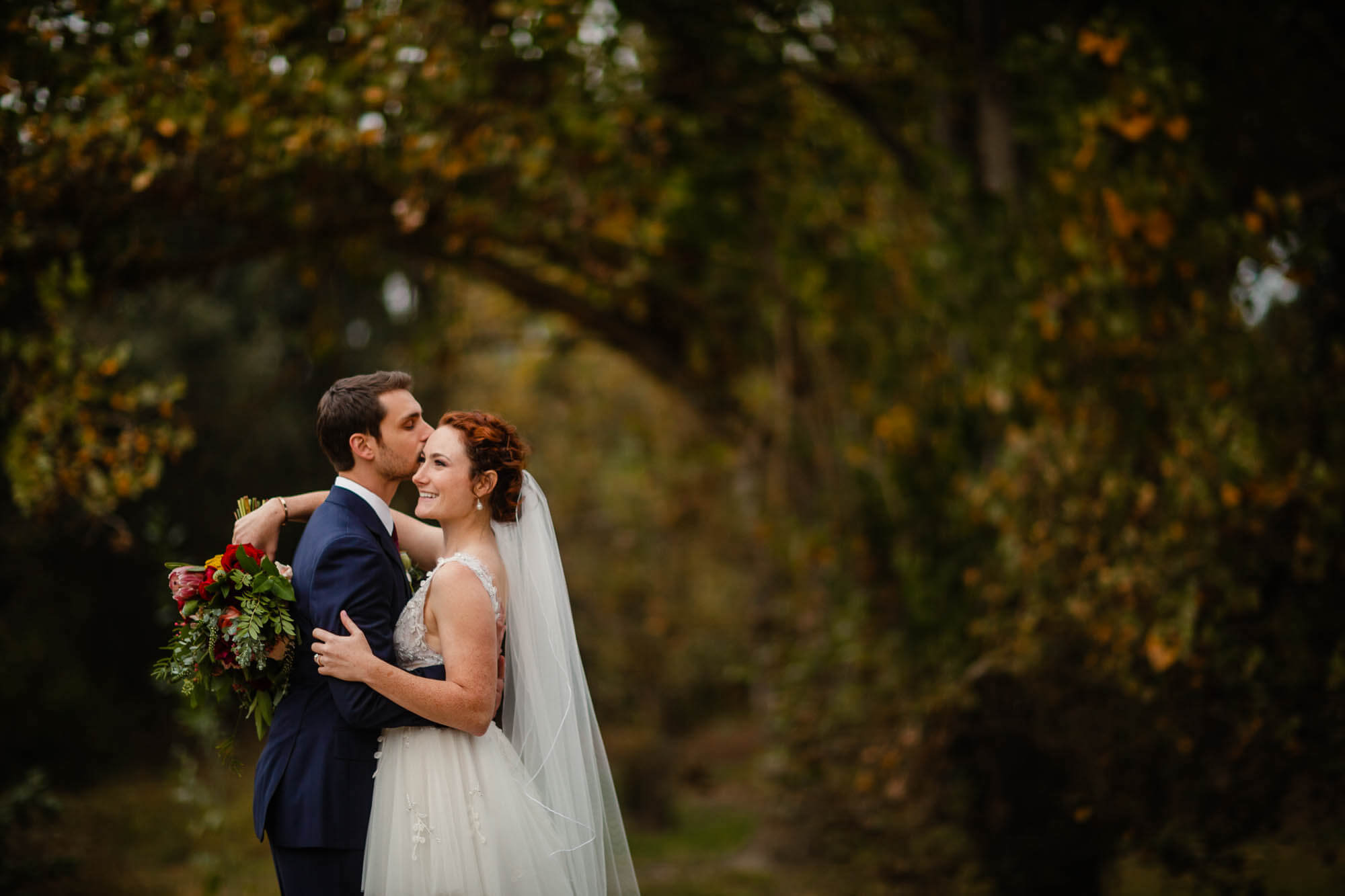 Portrait of a bride and groom with fall color