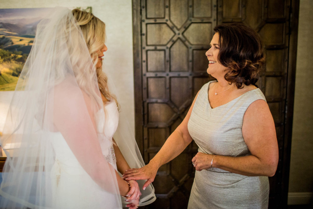 Tender moment between bride and her mother before the wedding