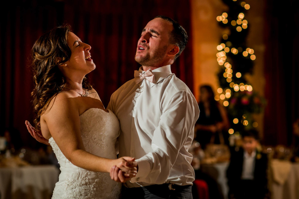 Bride dances with her brother at the wedding reception