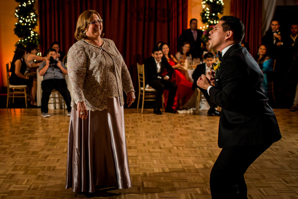Groom dances with his mom during the wedding reception