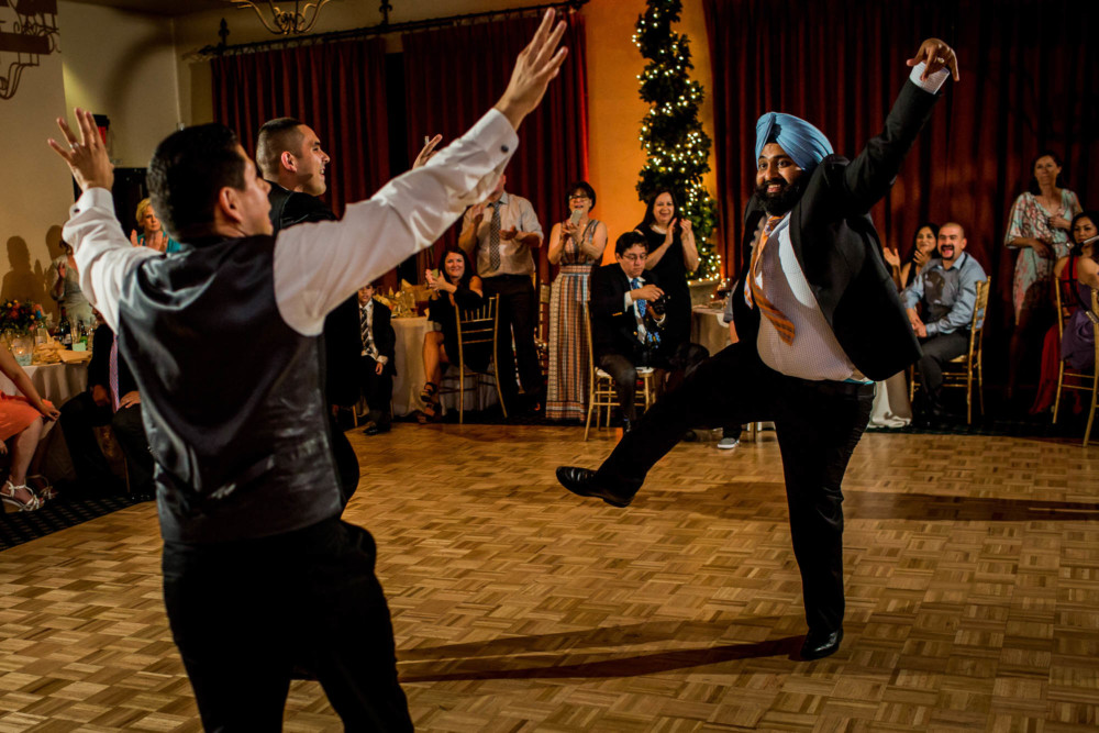 Crazy dance with a guy in a turban during the wedding reception