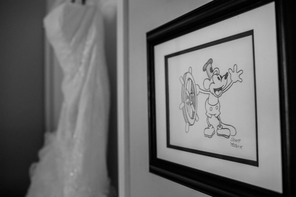 illustration of mickey mouse in front of wedding dress