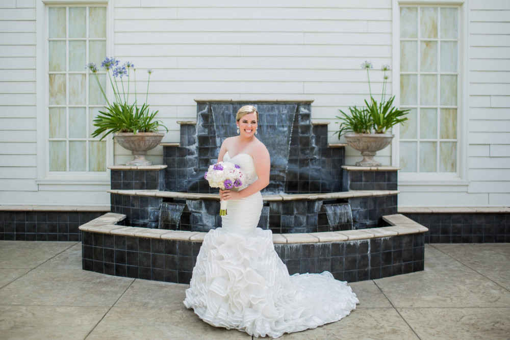 portrait of bride in front of People's church prayer fountain