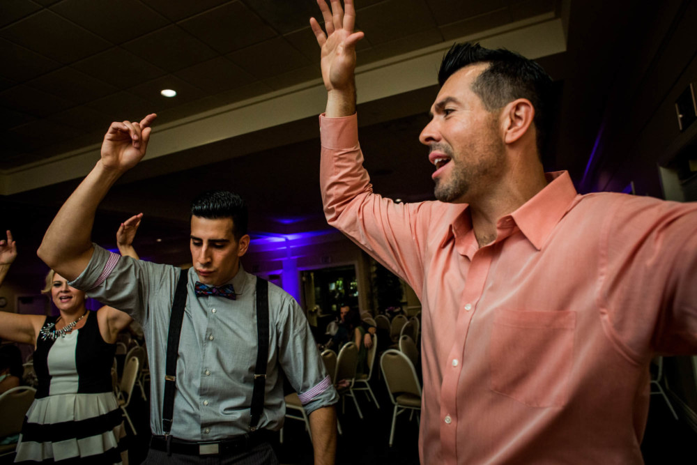 Wedding guests dance during the wedding reception