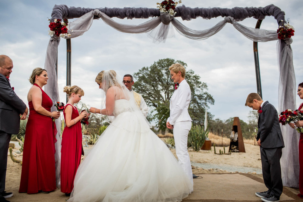 Bride takes her ring from her daughter