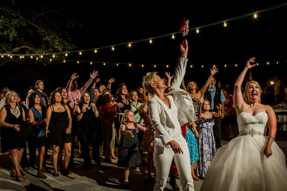 Brides throw the garter and bouquet at the same time during the wedding reception