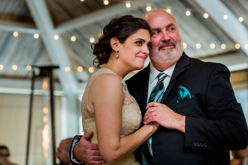 Bride dances with her father during the wedding reception