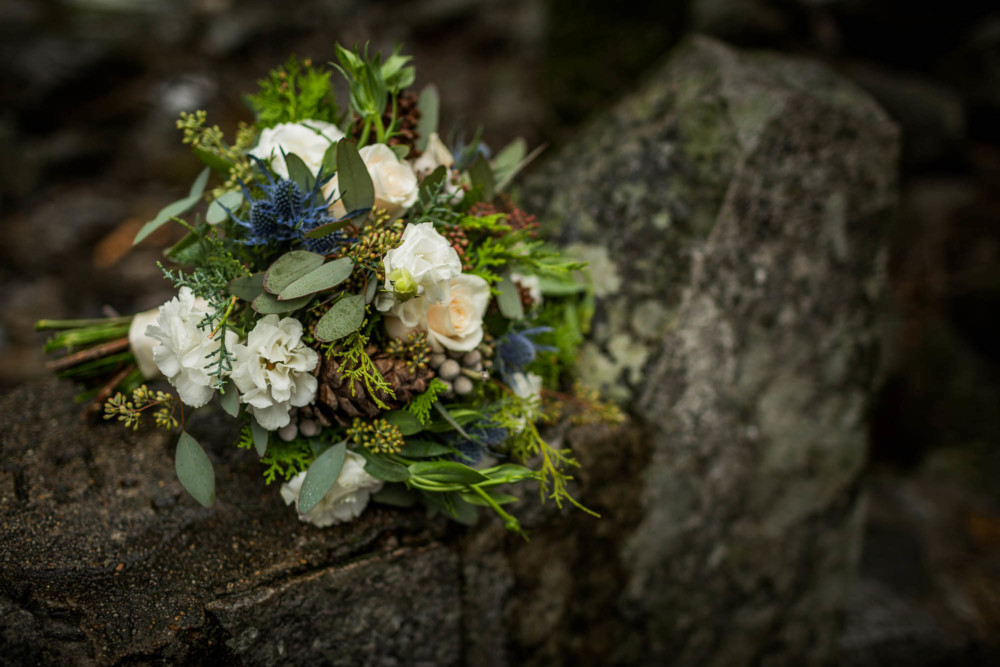 Bride's bouquet on a granite rock