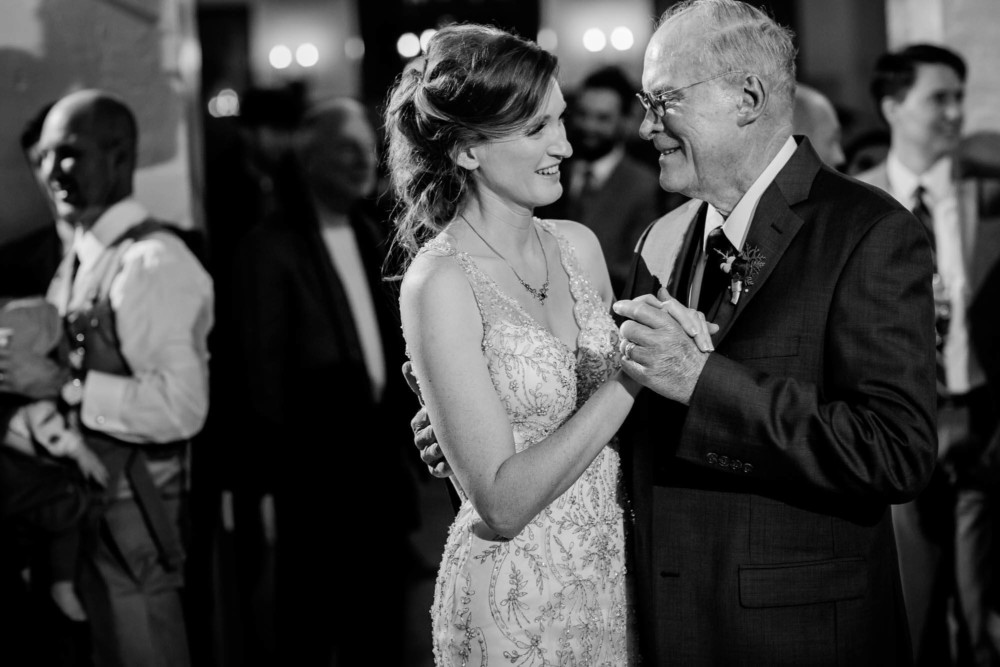 Bride and her father sharing a dance at her wedding reception in Yosemite