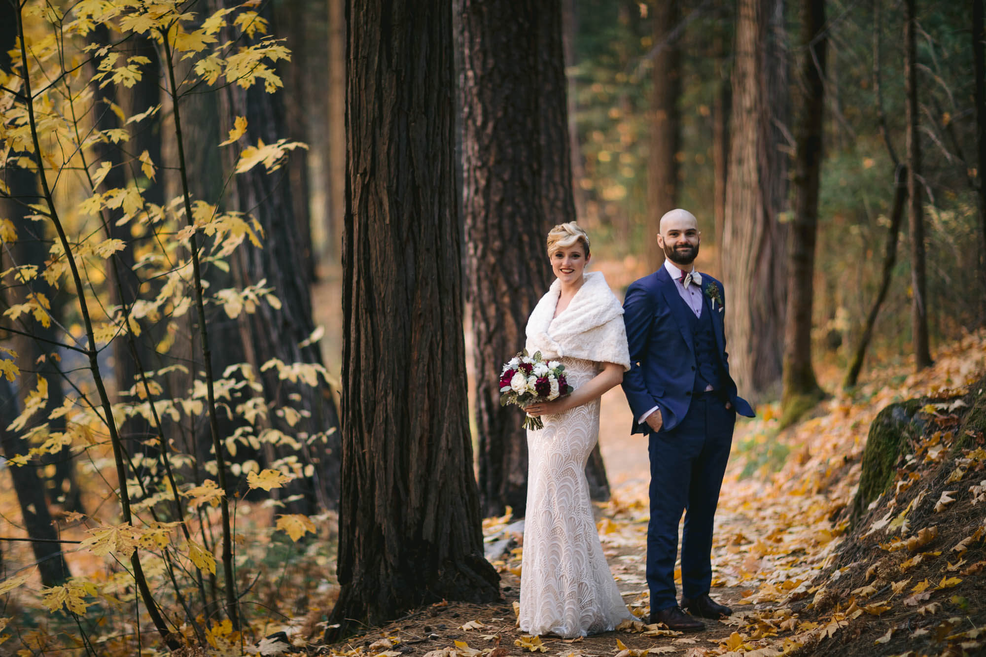 Bride and groom in the forest in Yosemite National Park