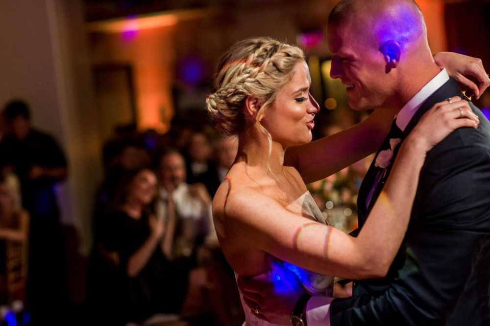 Bride and groom share an emotional moment during their first dance
