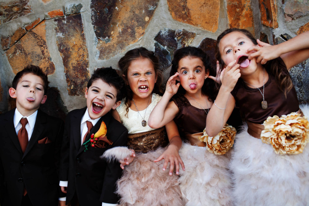 Kids acting crazy at a wedding