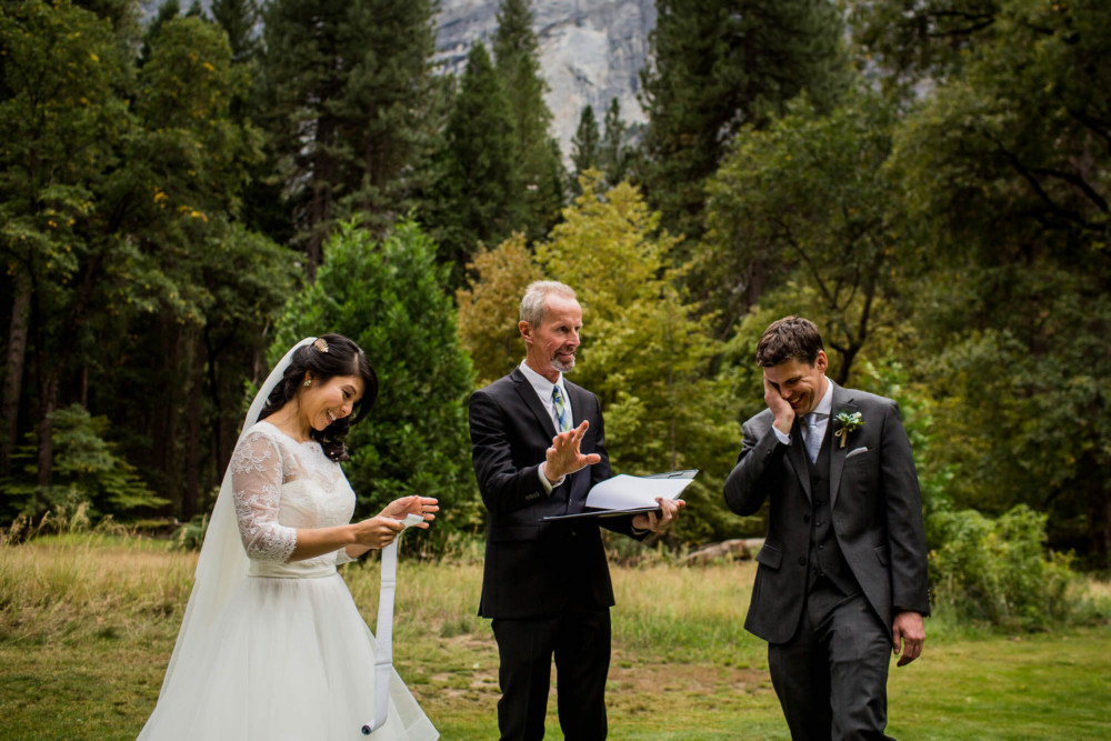 Groom reacts to bride's very long paper roll with her vows