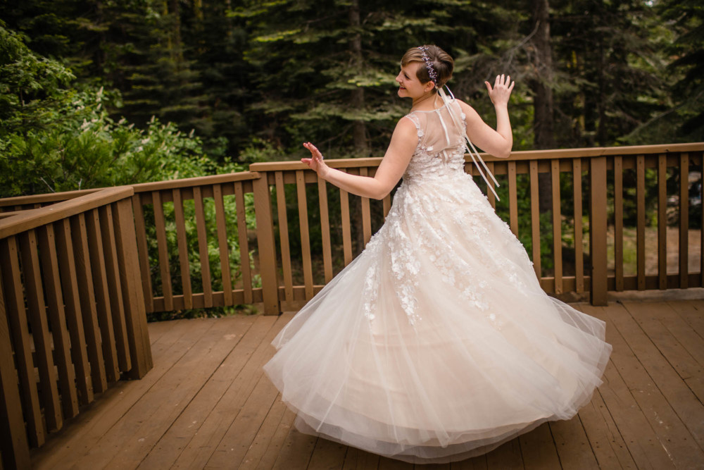 Bride twirls in her wedding gown
