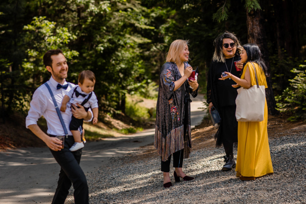 Guests chatting and laughing at a wedding at Paradise Springs near Yosemite National Park